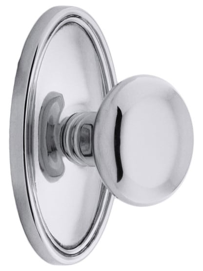 Oval Rosette Set With Providence Knobs in Polished Chrome.
